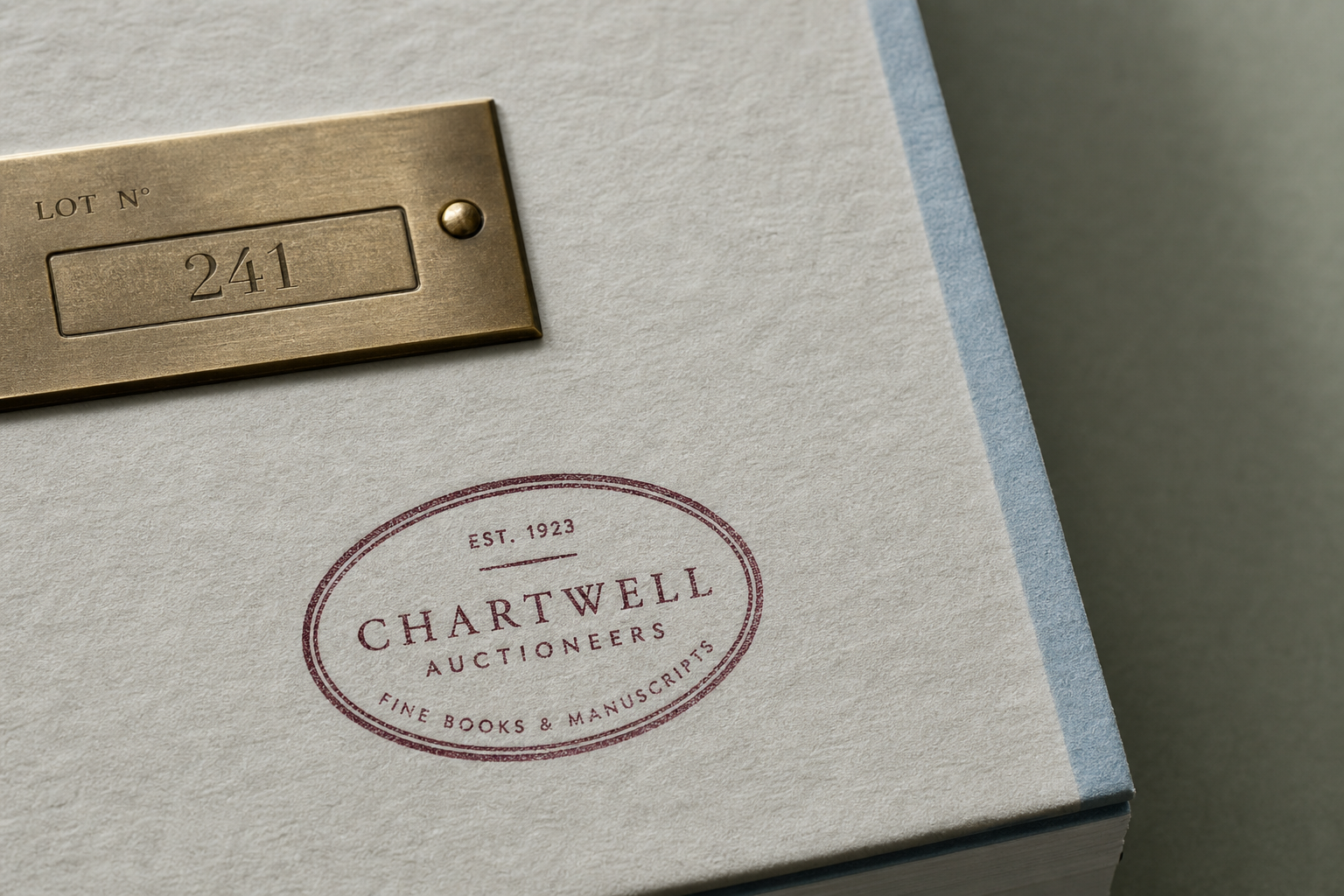 Vellum catalogue paper with brass label and burgundy registry mark